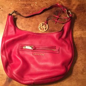 Red Michael Kors handbag